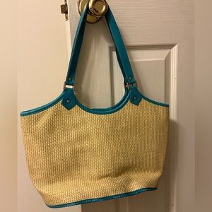 Caslon straw handbag with blue trim and blue plaid lining.